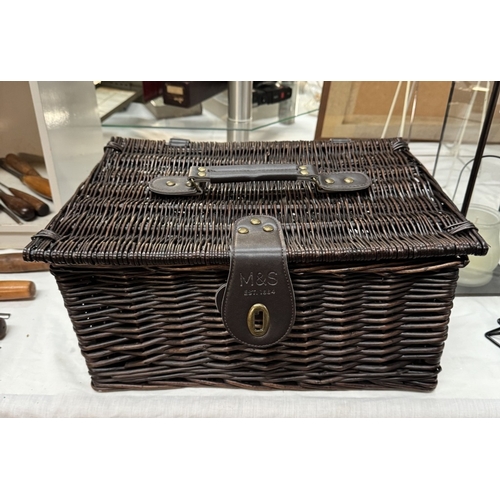 905 - 2 Wicker picnic baskets & A quantity of candle holders