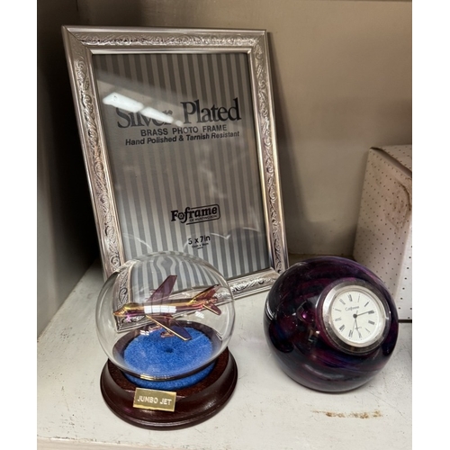 906 - A glass ship in bottle, good selection of paperweights including Caithness clocks etc