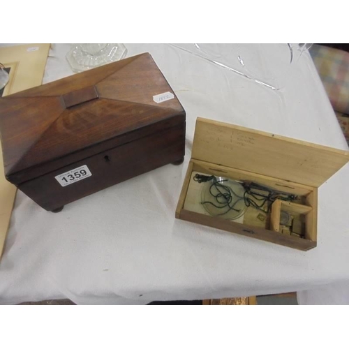 1359 - A Victorian mahogany tea caddy and a cased set of precious metal scales.