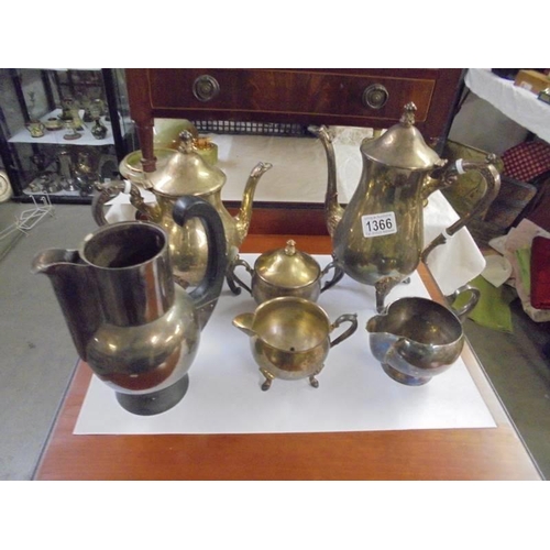 1366 - A quantity of silver plate including coffee pots, jugs etc.,