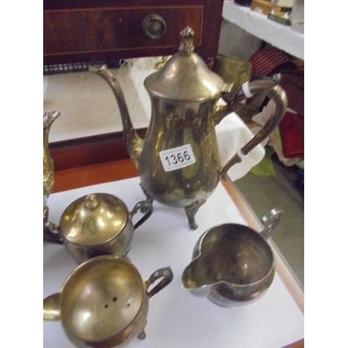 1366 - A quantity of silver plate including coffee pots, jugs etc.,