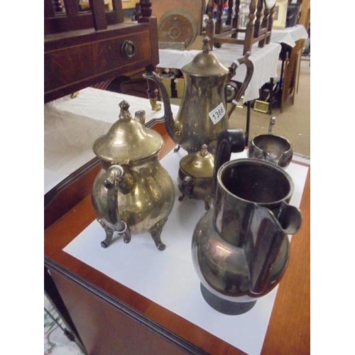 1366 - A quantity of silver plate including coffee pots, jugs etc.,