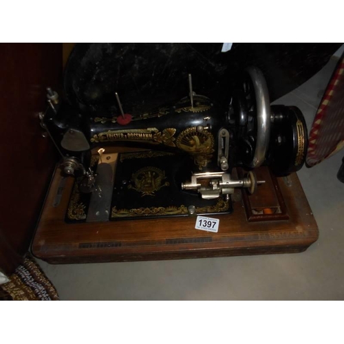 1397 - A vintage cased Frister and Rossman sewing machine, COLLECT ONLY.