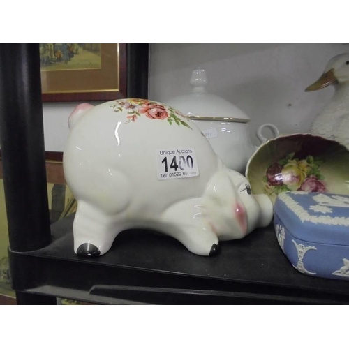 1400 - A good lot of ceramics including soup tureen, piggy bank, duck etc., COLLECT ONLY.