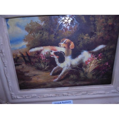 1407 - A framed overpainted print featuring dogs.