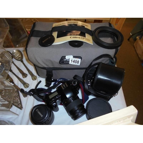 1408 - A cased Canon camera with accessories.