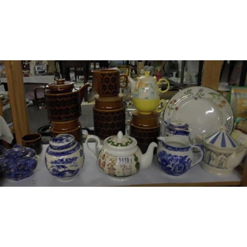 1410 - A mixed lot of teapots, storage jars etc., COLLECT ONLY.