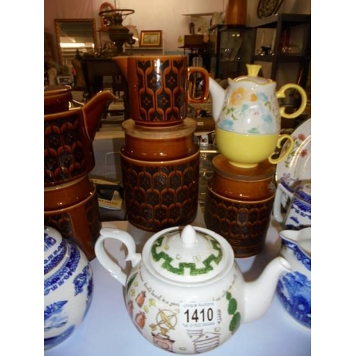 1410 - A mixed lot of teapots, storage jars etc., COLLECT ONLY.