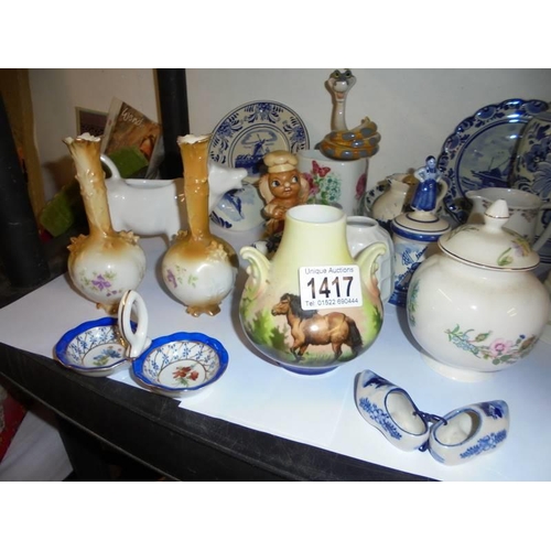 1417 - A mixed lot of ceramics including vases, cups, plates etc.,