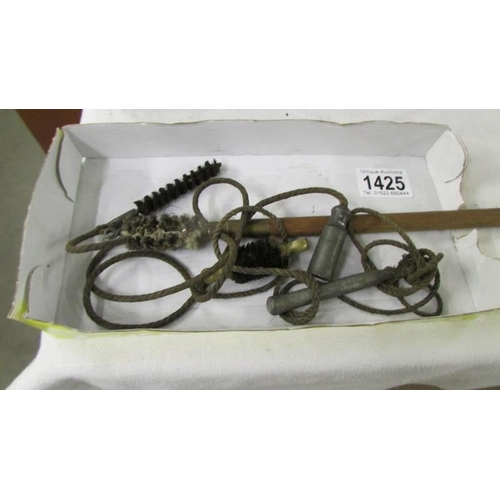 1425 - An old rifle cleaning kit.