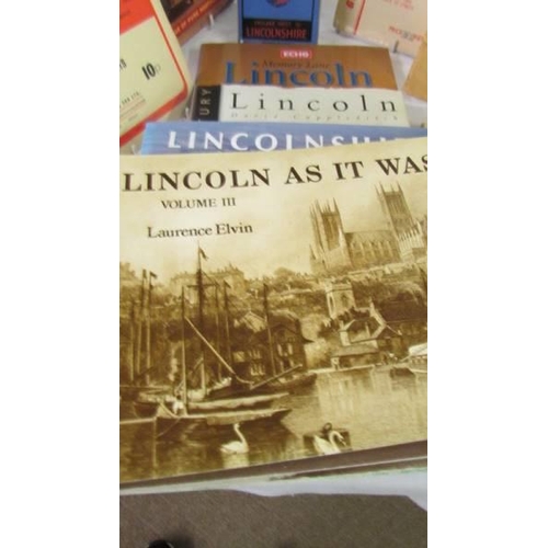 1427 - A framed and glazed map of Lincolnshire, various maps and books all relating to Lincolnshire. COLLEC... 