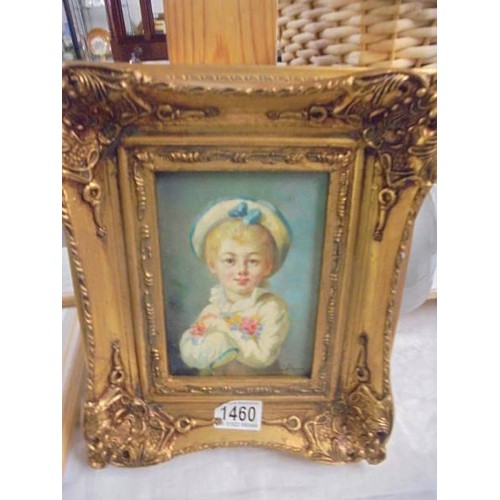 1460 - A gilt framed over painted portrait print of a small boy.