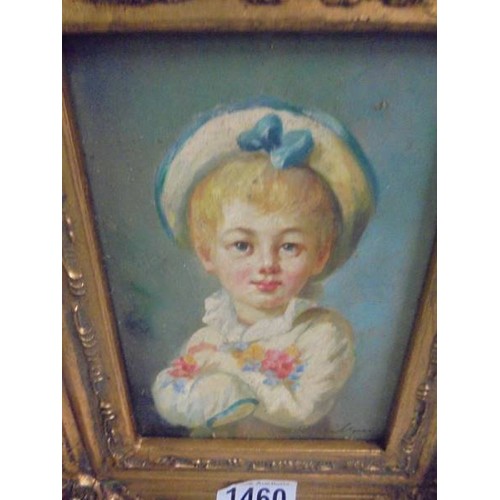 1460 - A gilt framed over painted portrait print of a small boy.