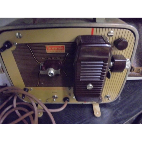 1495 - A cased Brownie 8 x 58 projector.