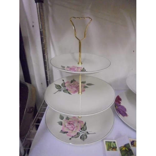 1500 - A three tier, two tier and single tier cake stands.