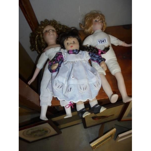 1541 - Three old dolls.