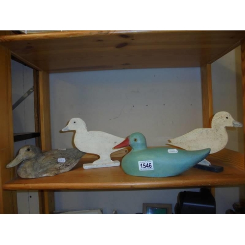 1546 - Four duck ornaments.