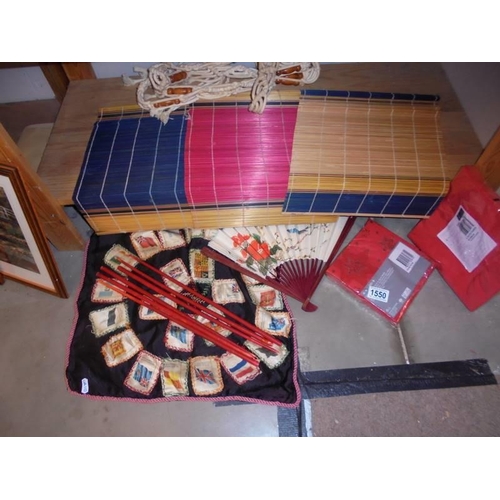 1550 - A quantity of tableware including table mats, chopsticks, napkins etc.,