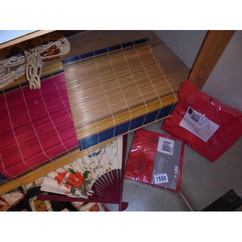 1550 - A quantity of tableware including table mats, chopsticks, napkins etc.,