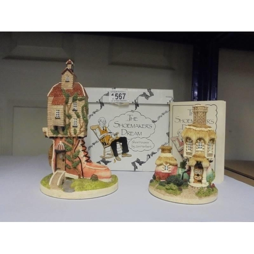 1567 - A boxed set of two The Shoemakers Dream shoe houses by Jon Herbert.