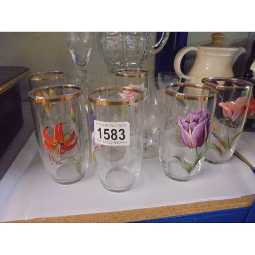 1583 - A set of six floral decorated tumblers and other glassware.