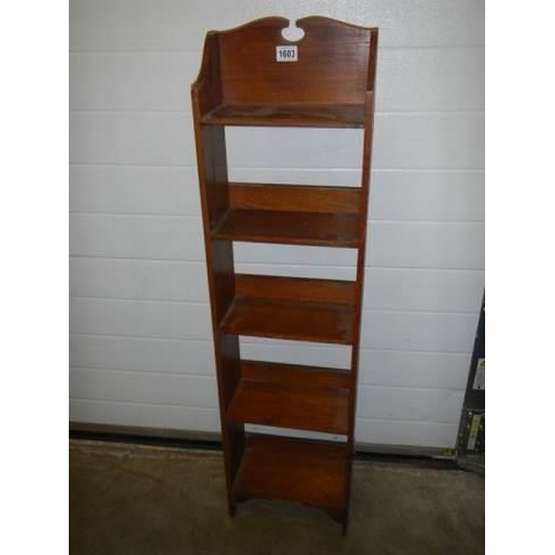 1603 - A narrow five shelf bookcase,. COLLECT ONLY.