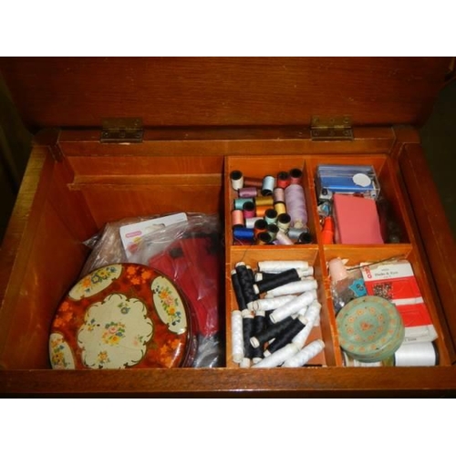 1611 - A good sewing box complete with contents. COLLECT ONLY.