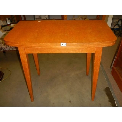 1612 - A good quality limed oak fold over table, COLLECT ONLY.