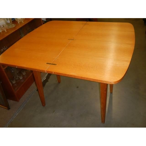 1612 - A good quality limed oak fold over table, COLLECT ONLY.