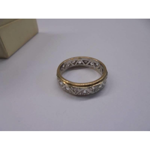 1036 - A 9ct gold full eternity ring set white stones, size N.