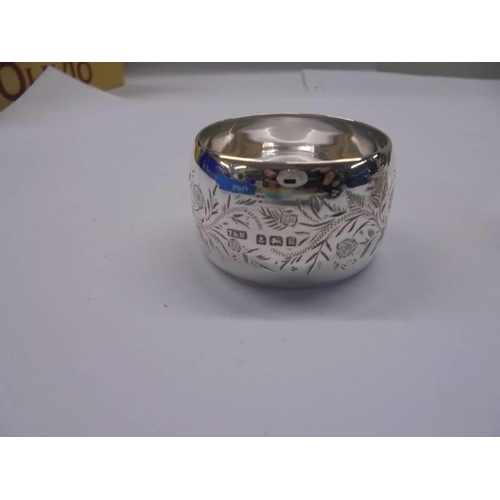 1045 - Three hall marked silver napkin rings, 1.72 ounces.