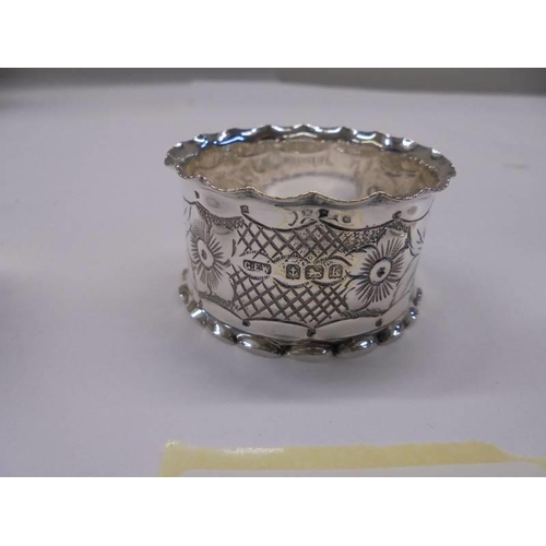 1045 - Three hall marked silver napkin rings, 1.72 ounces.