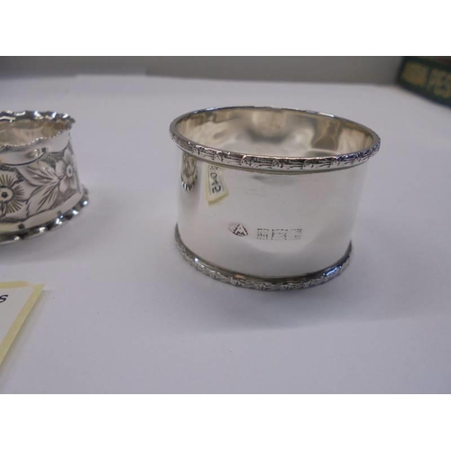 1045 - Three hall marked silver napkin rings, 1.72 ounces.