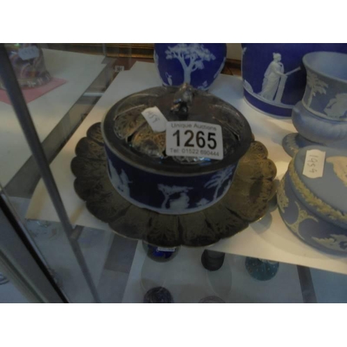 1265 - A quantity of Wedgwood Jasper ware including vases, trinket boxes, butter dish (a/f),etc.,