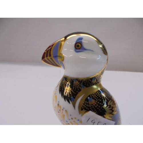 1270 - A Royal Crown Derby puffin with silver stopper.