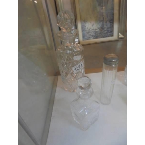 1274 - A good quality cut glass decanter, a smaller example and three scent bottles.