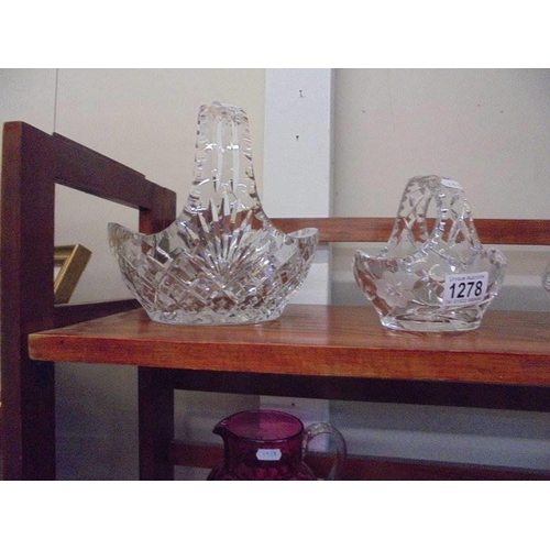 1278 - Four good quality cut glass baskets in various sizes.