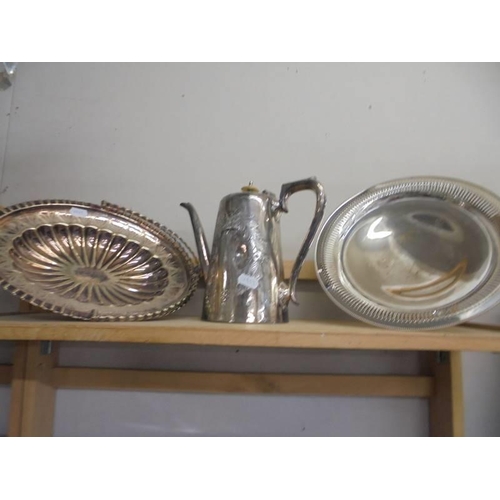 1295 - A good lot of silver plate including cruet, sauce boats, cake stand, napkin rings, basket etc.,