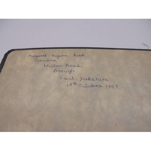 1133 - An early 20th century autograph book with paintings and drawings.