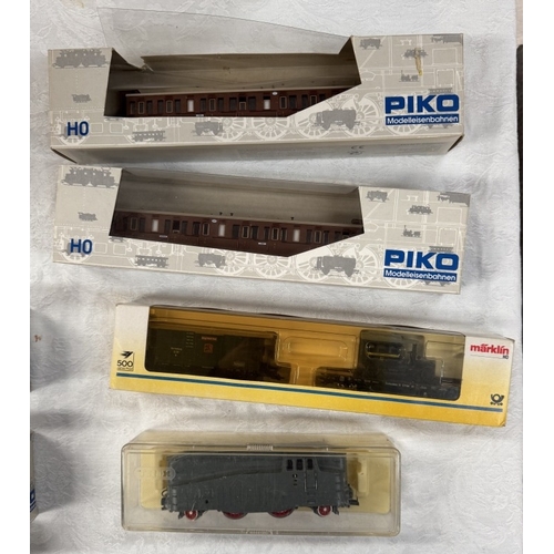 171 - A quantity of HO gauge engines & goods wagons including Lima, Marklin, Piko etc