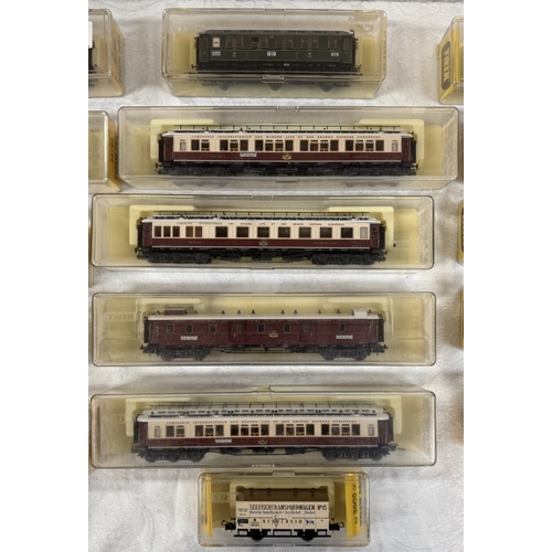 173 - 16 Boxed Trix HO gauge goods wagons & coaches