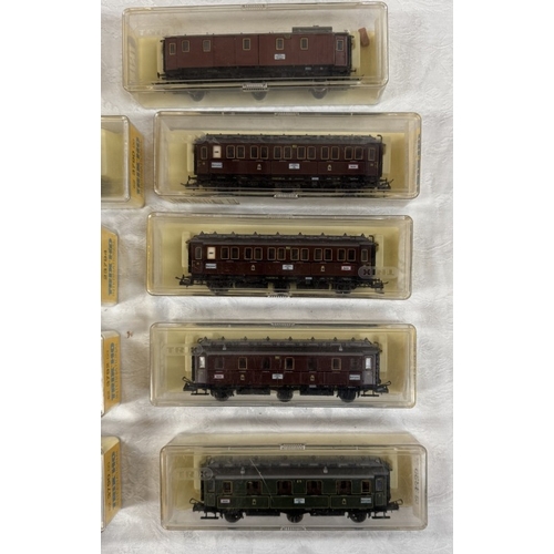 173 - 16 Boxed Trix HO gauge goods wagons & coaches