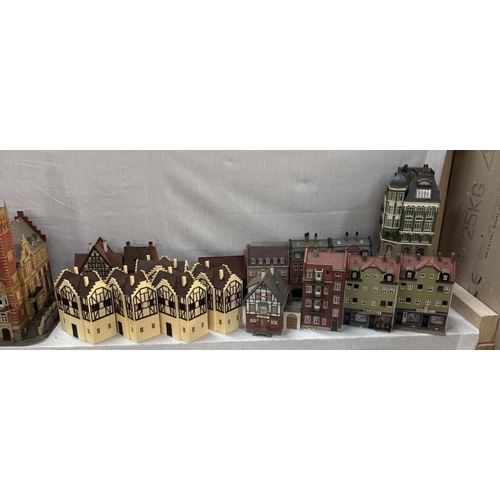 182 - A large collection of HO gauge model buildings of a German town (Collect Only)