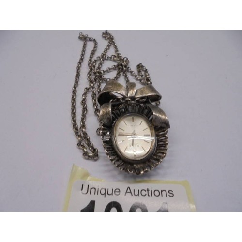 1061 - A silver cased 1975 Rona ladies pendant/brooch watch on 35cm chain, 0.7 ounces/21.2 grams including ... 