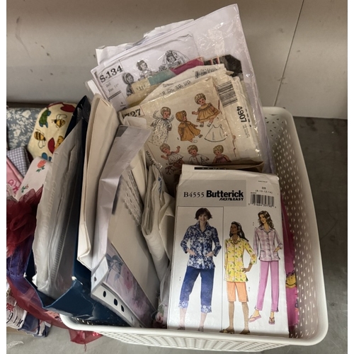 15 - A quantity of material & sewing patterns etc