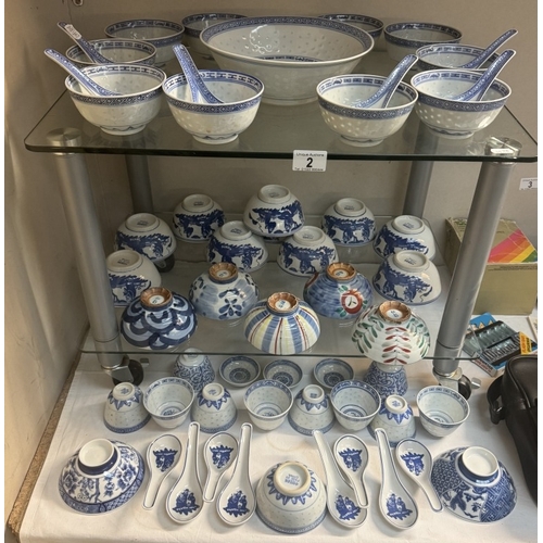 2 - A large quantity of Chinese blue & white soup bowls, spoons etc