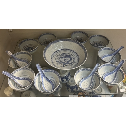 2 - A large quantity of Chinese blue & white soup bowls, spoons etc