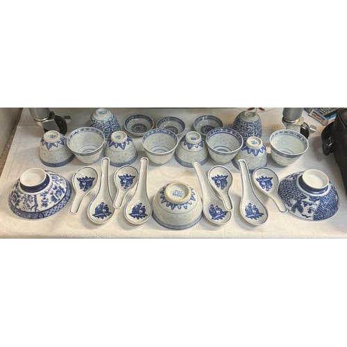 2 - A large quantity of Chinese blue & white soup bowls, spoons etc