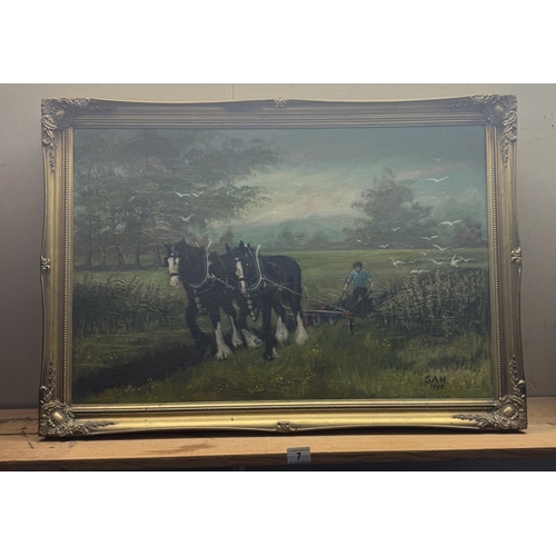 7 - A large gilt framed oil on canvas of working heavy horses signed SAH 1995