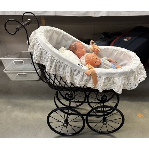 1627 - A Victorian style dolls pram with dolls